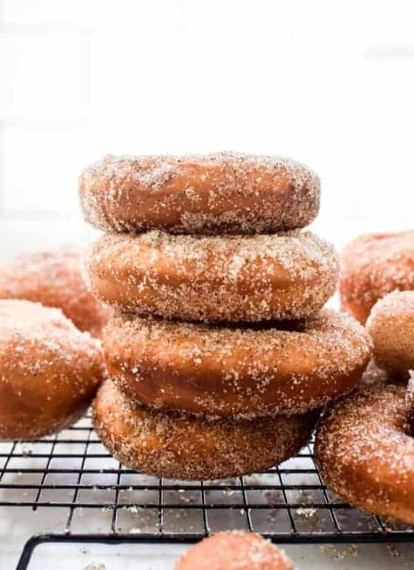 A stack of cinnamon sugar coated donuts 