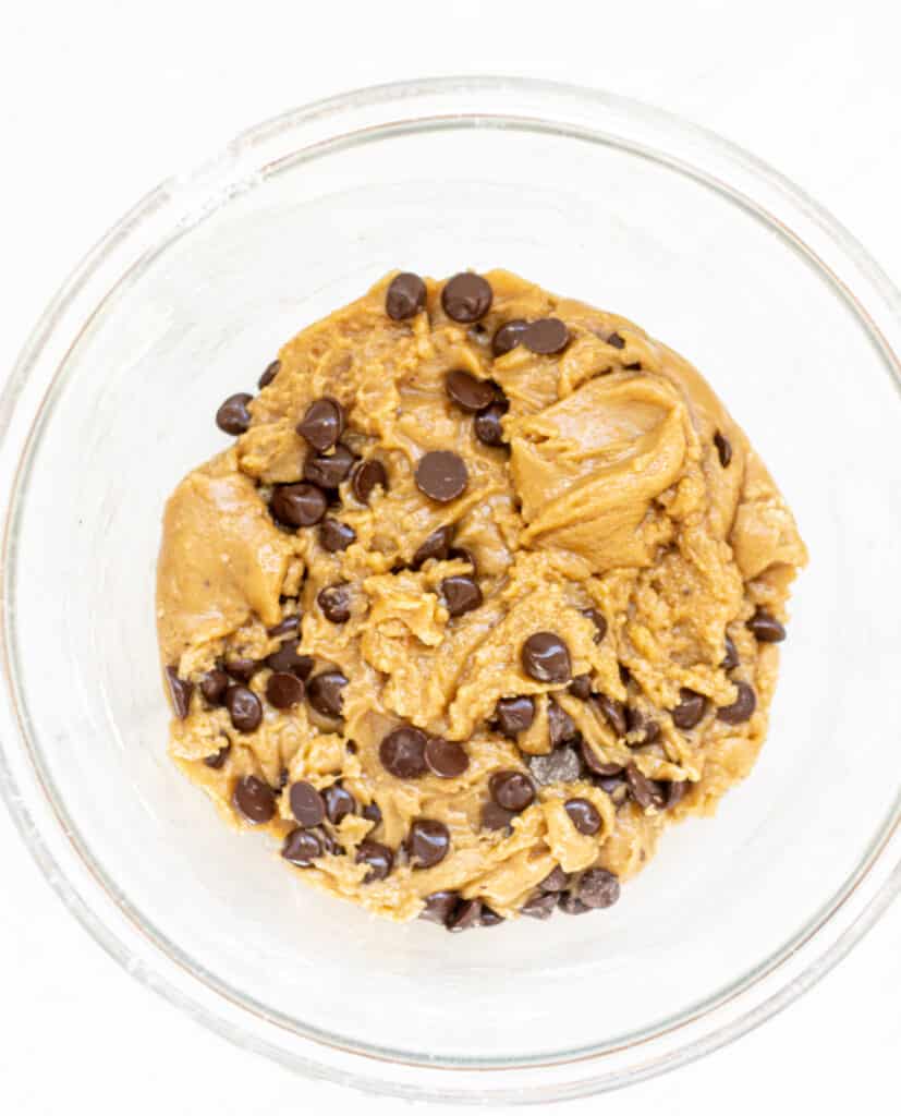 a bowl of cookie dough with chocolate chips