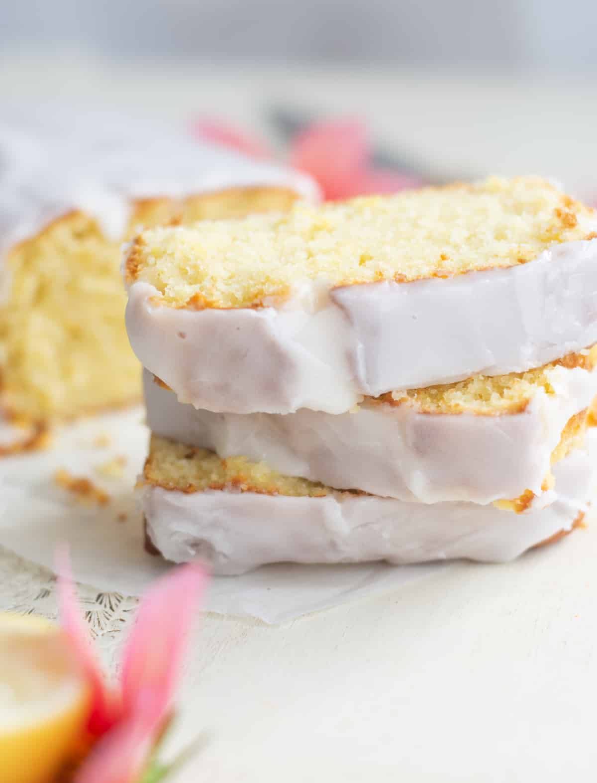 stacked lemon loaf slices with white icing