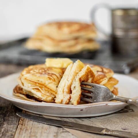 stack of pancakes with a fork