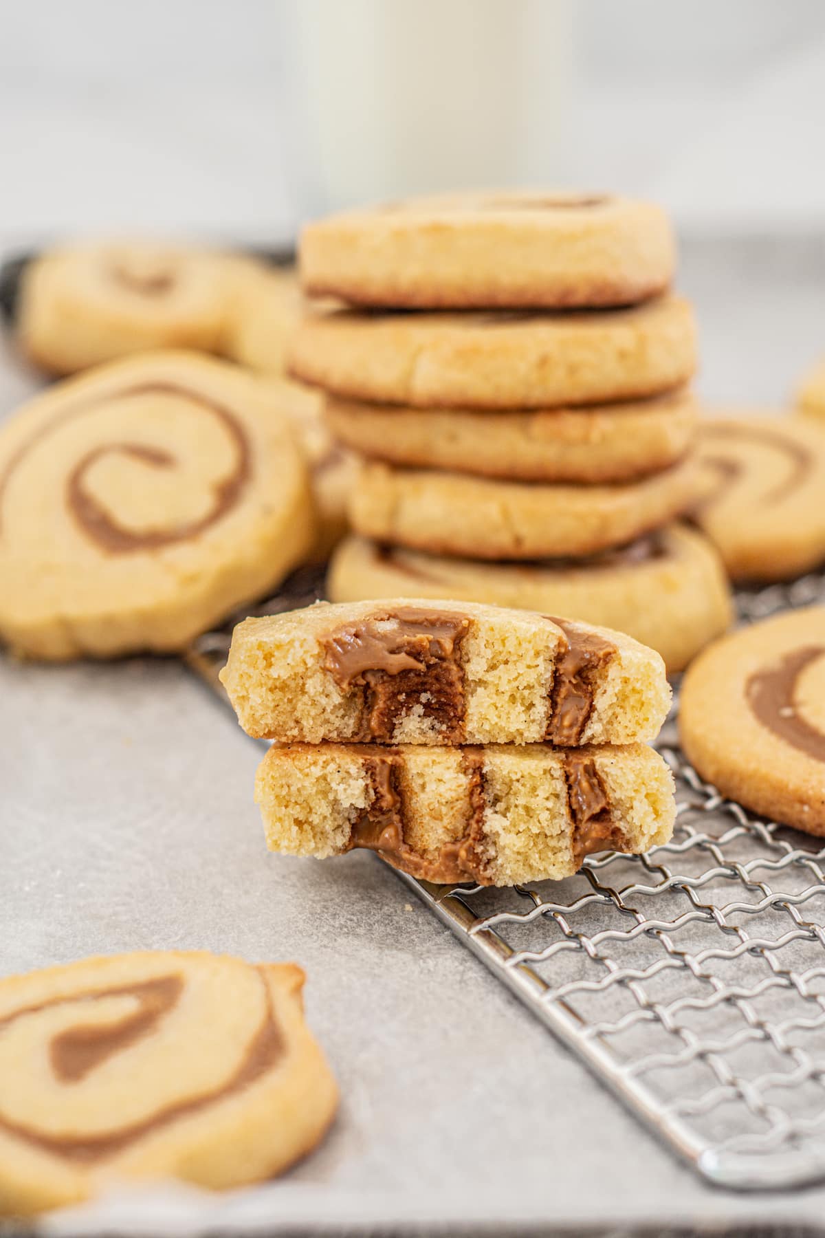 a halved cookie with swirls of cookie butter.