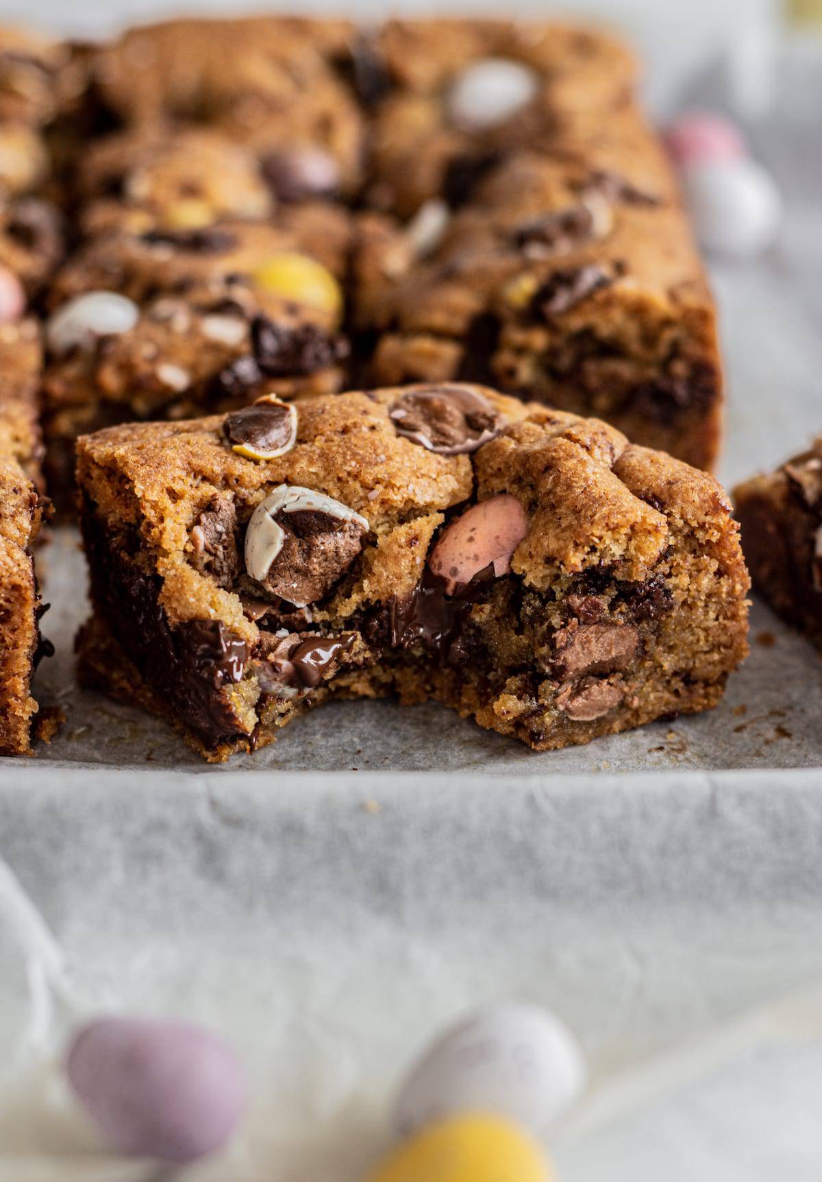 a cookie bar with a bite out of it.
