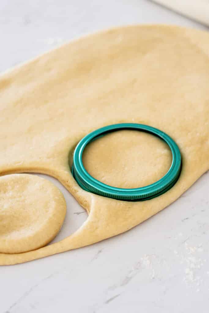 dough with a cookie cutter.