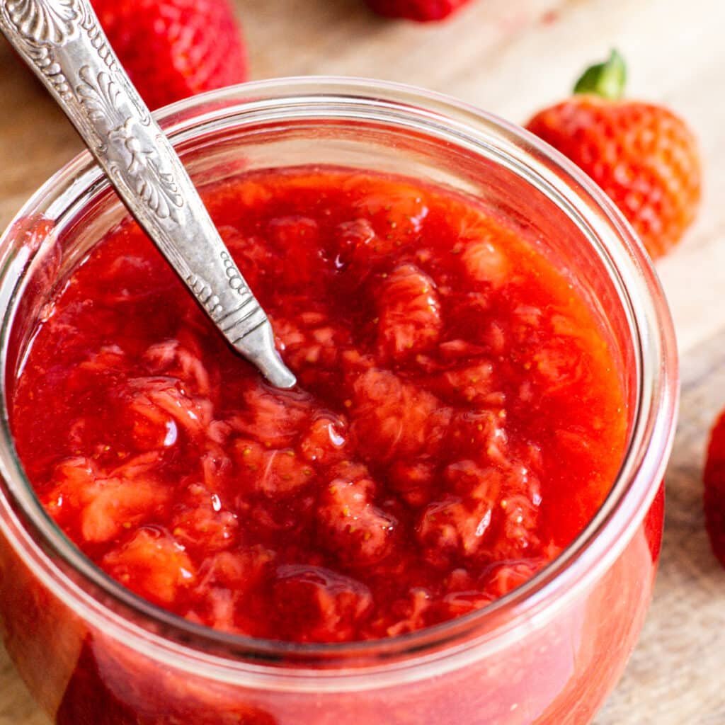 a jar of strawberry cupcake filling.