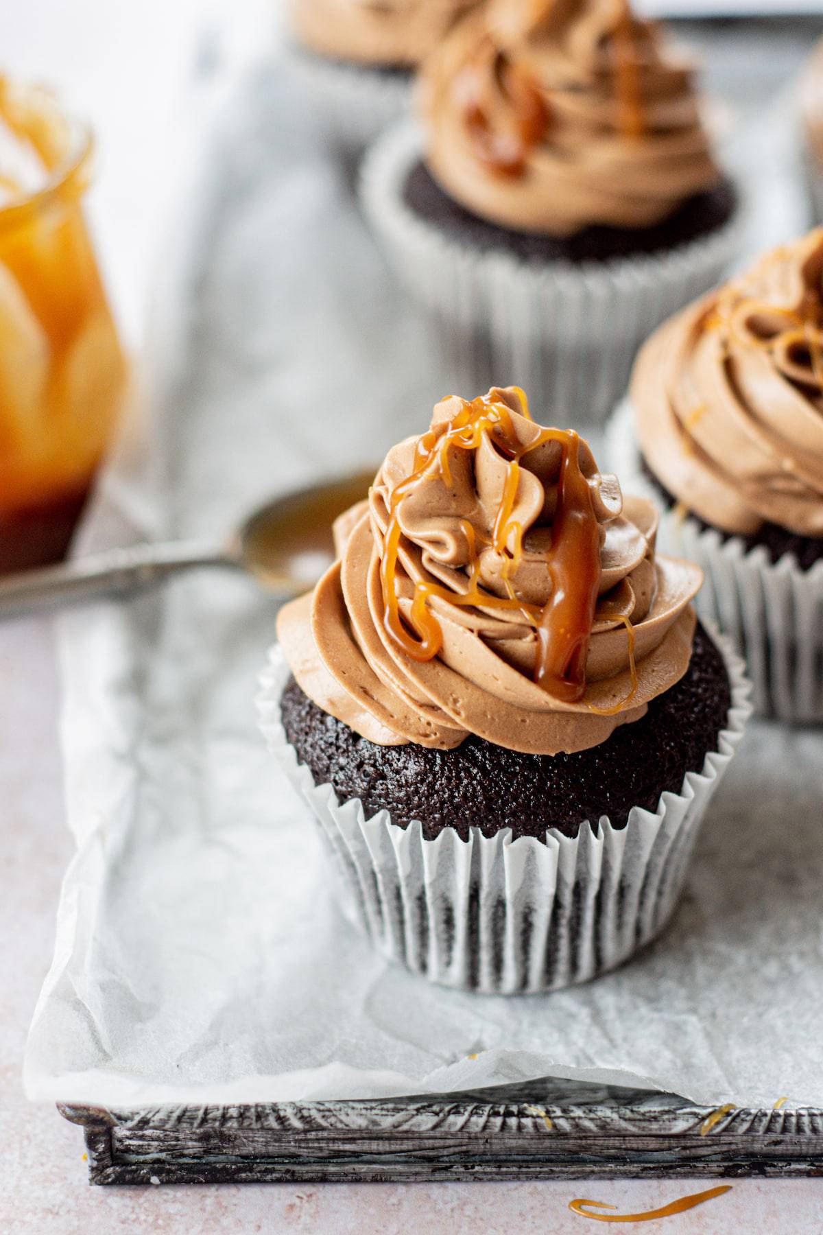caramel and chocolate topped cupcake.
