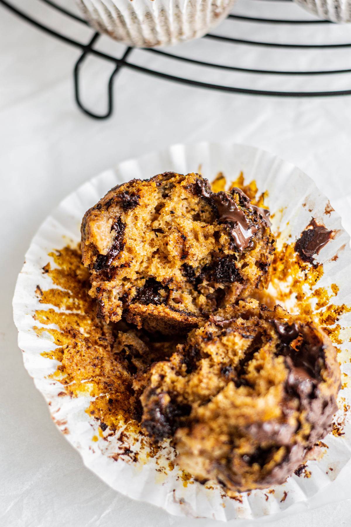 a broken muffin with melted chocolate.