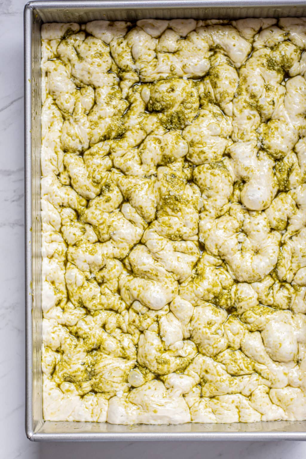 Basil Pesto Focaccia Bread Baking With Butter