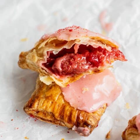 halved turnover with strawberries.
