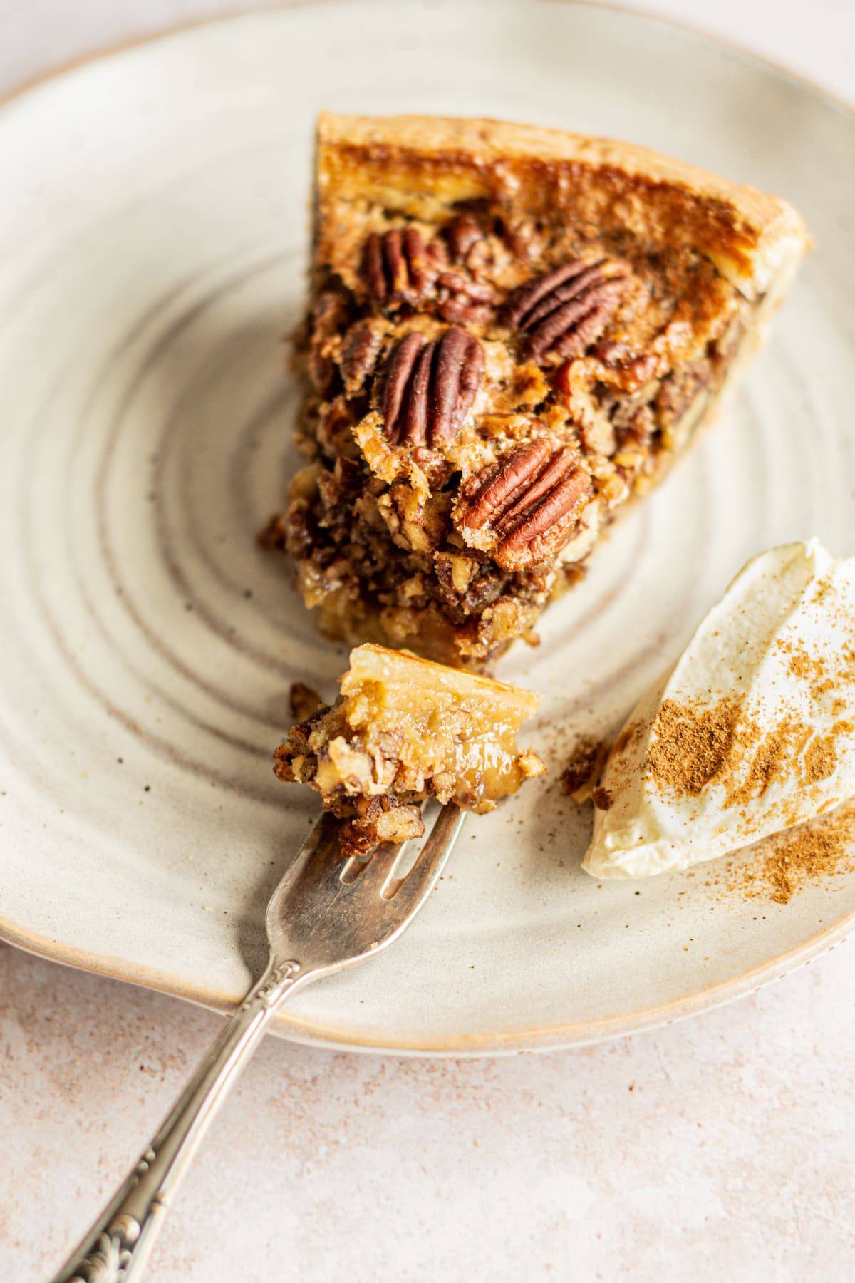 a forkful of pecan pie.