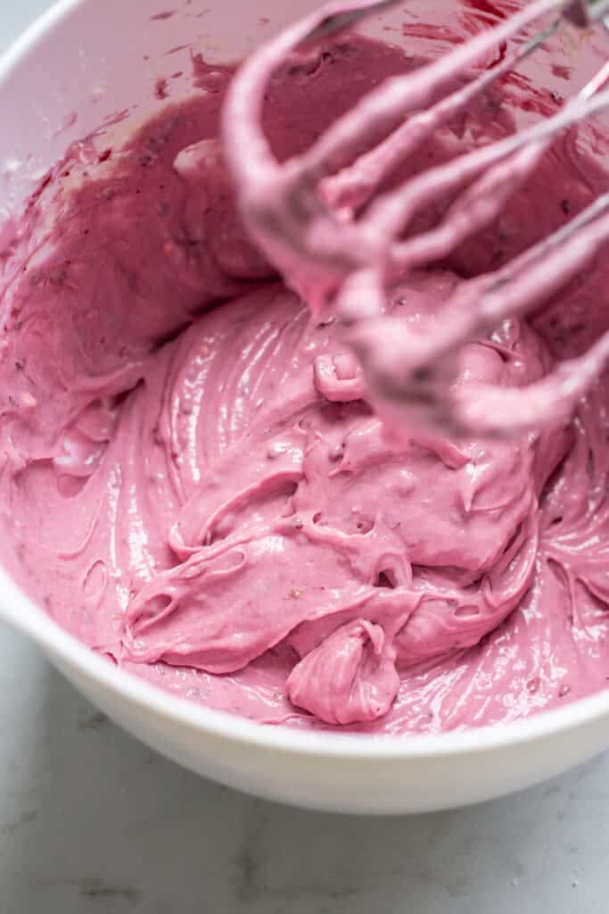 a bowl of purple frosting.