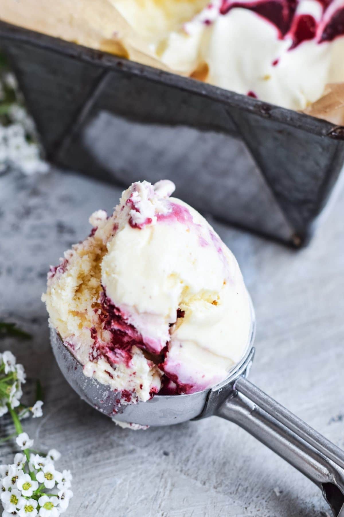 a scoop of ice cream with purple swirls.