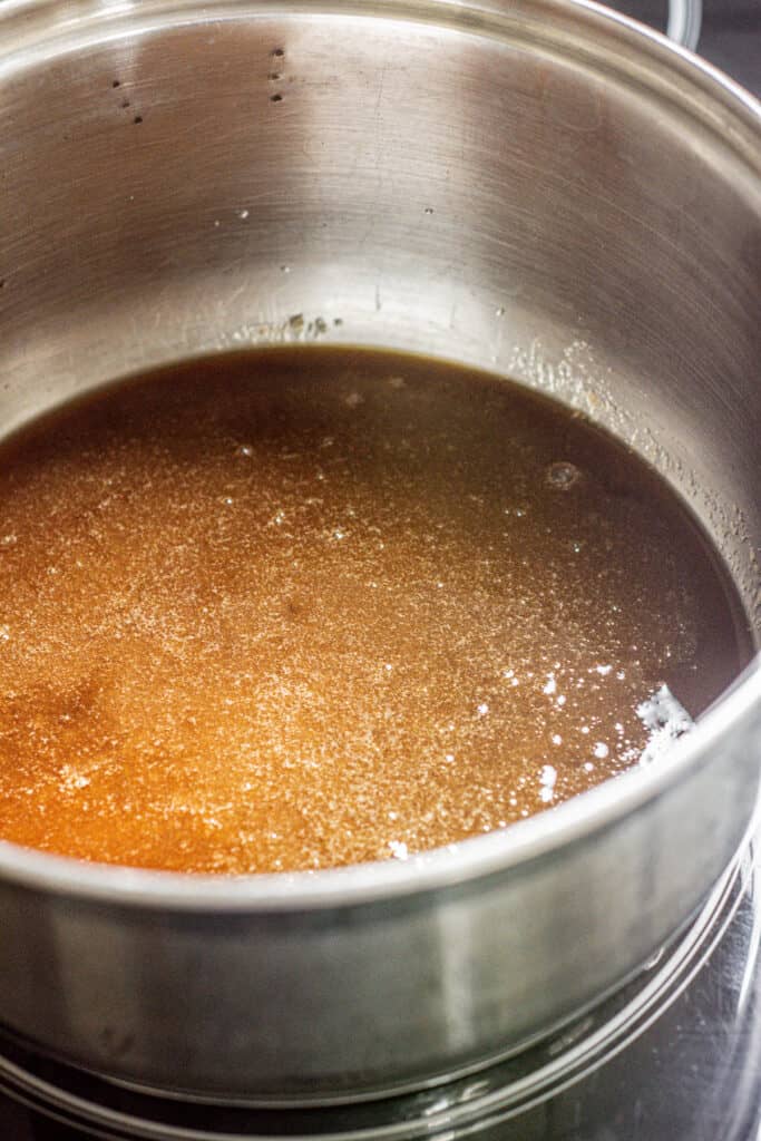 a pan of brown sugar liquid.