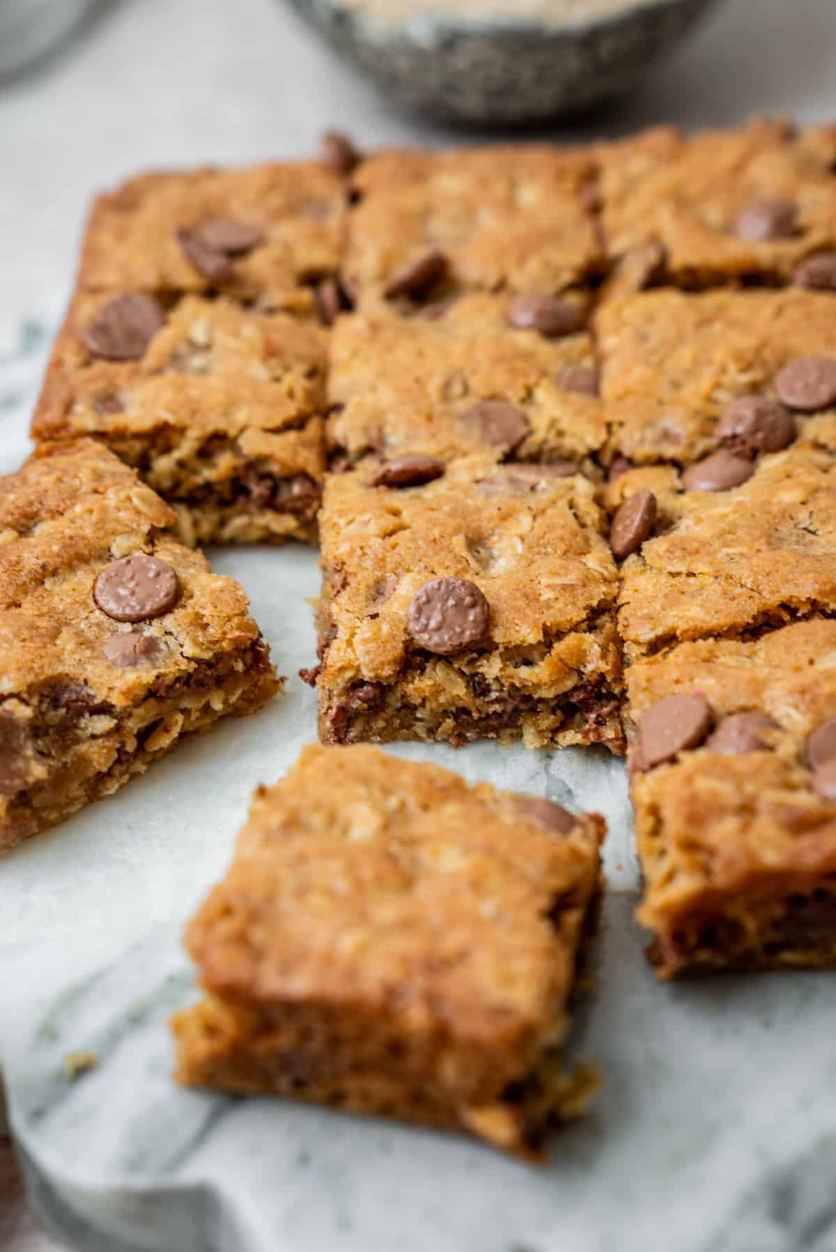 A tray of sliced oatmeal chocolate chip bars.