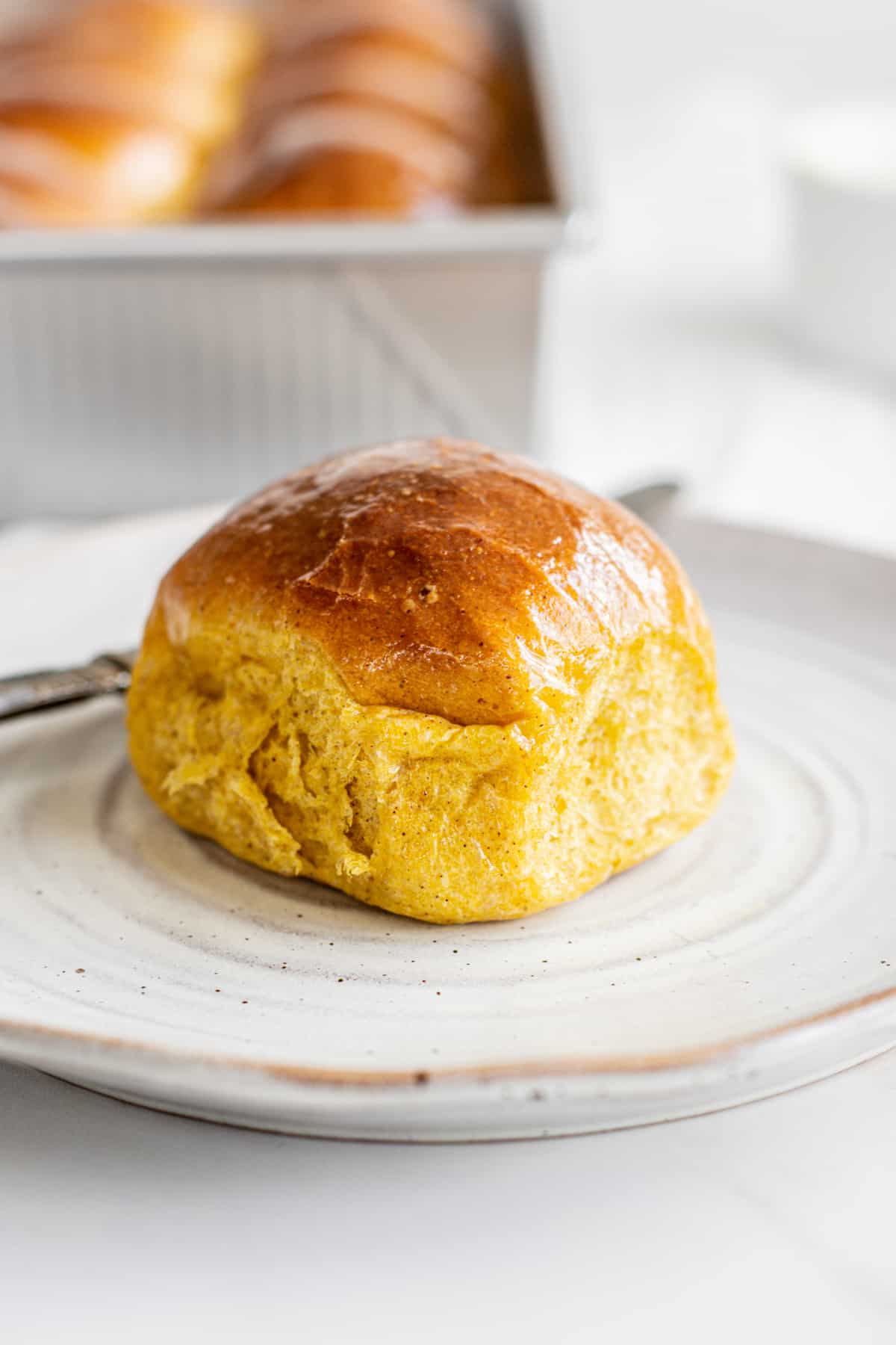 soft dinner roll on a plate.