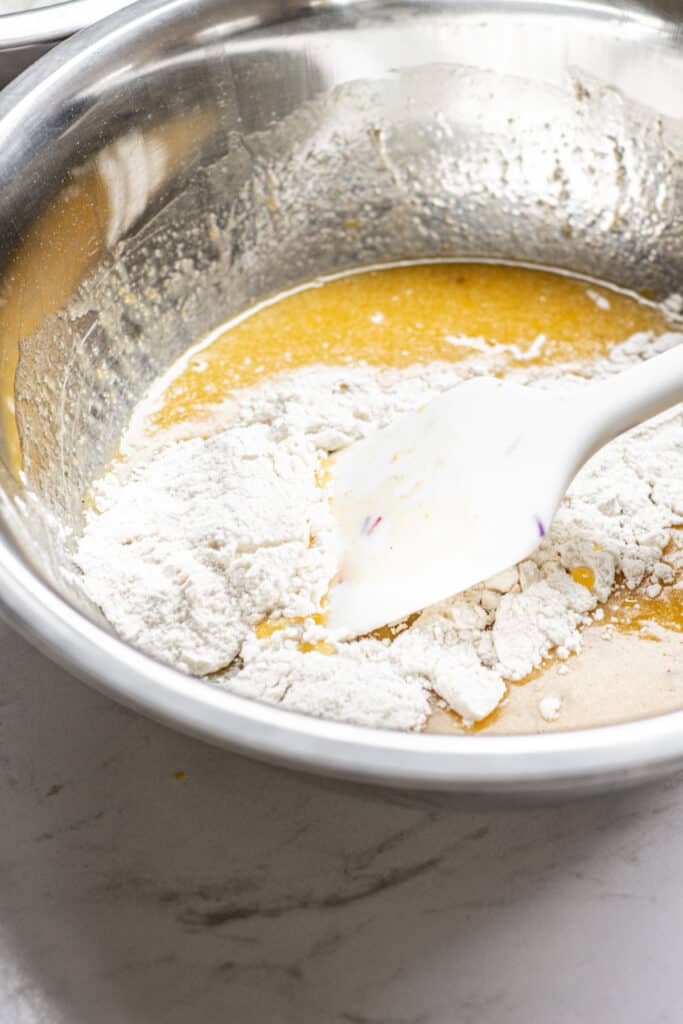 silver pan of batter and flour.