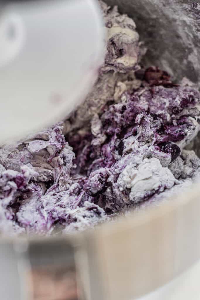 purple dough being mixed.