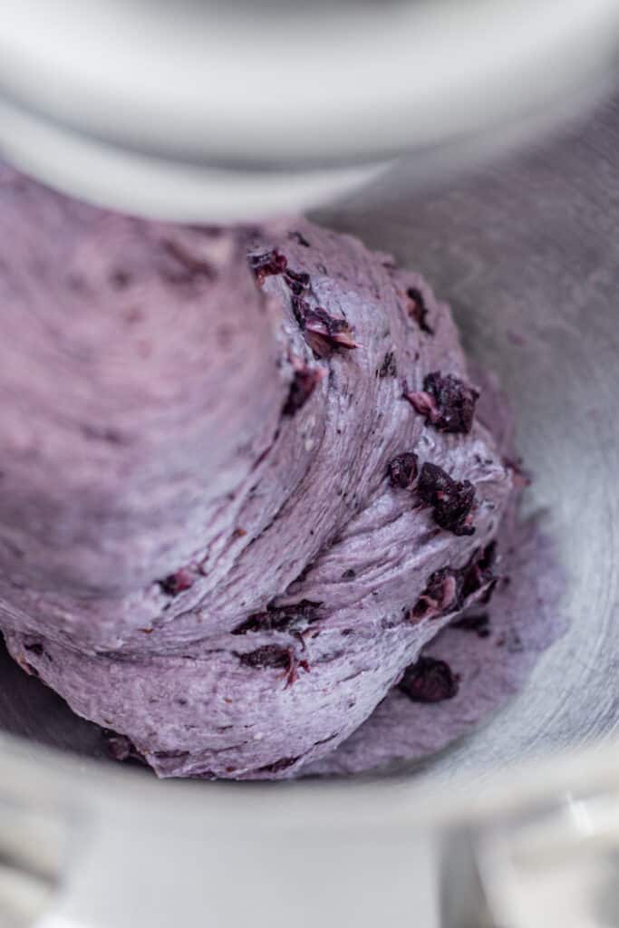 a bowl of purple dough.