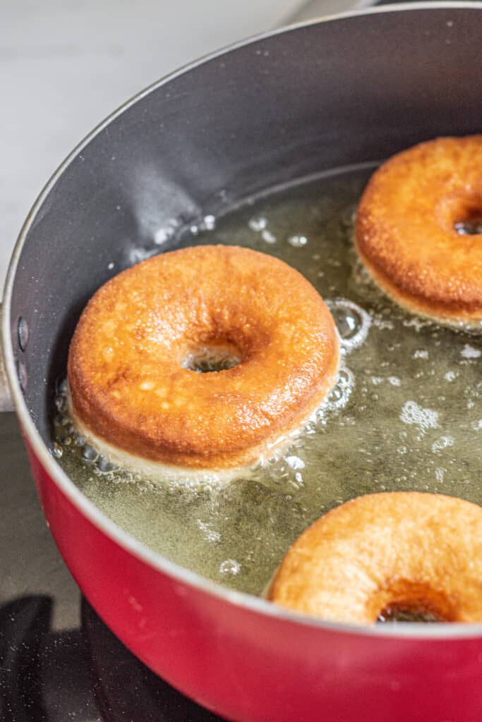 frying donuts.