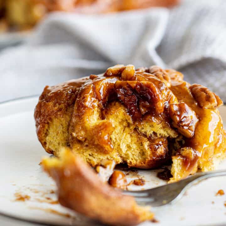 half eaten sticky bun.