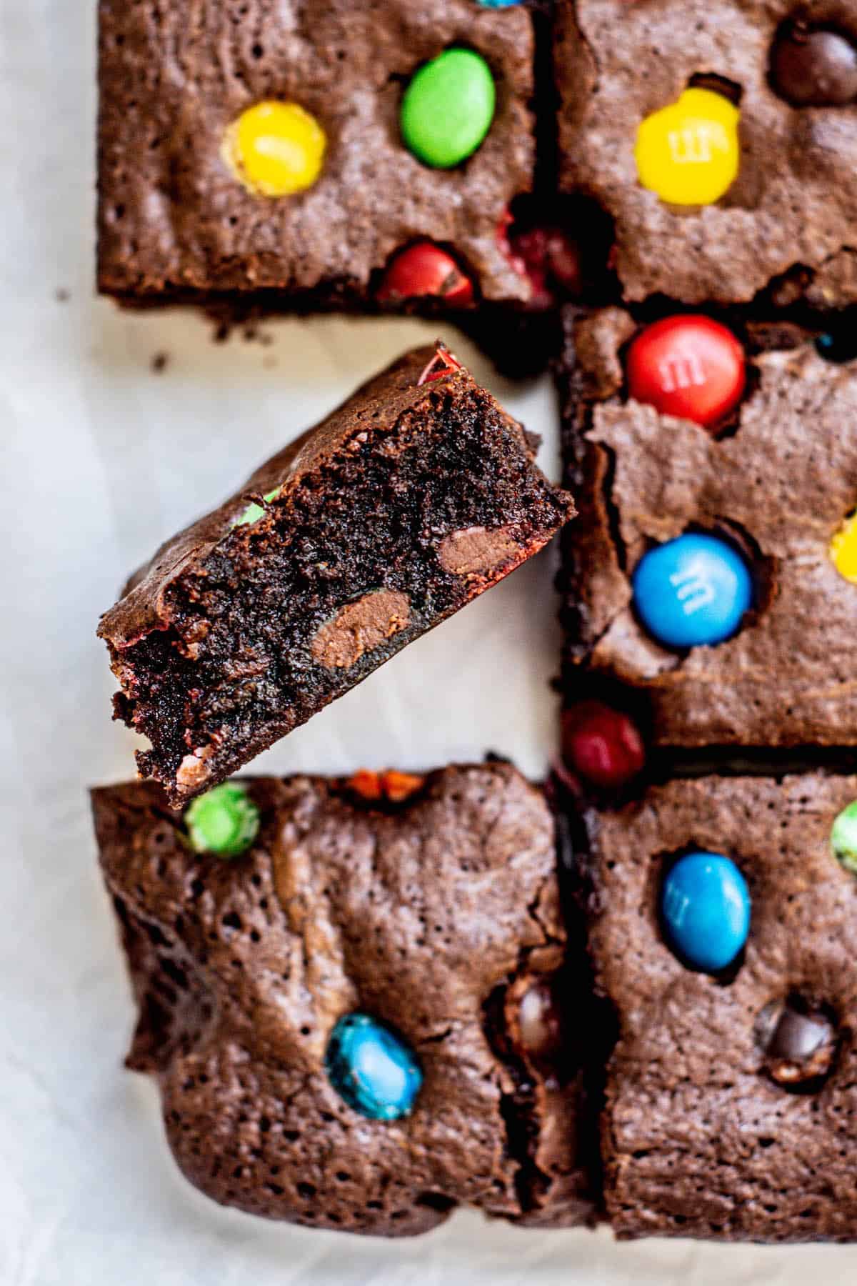 close up of chocolate brownie with m&ms