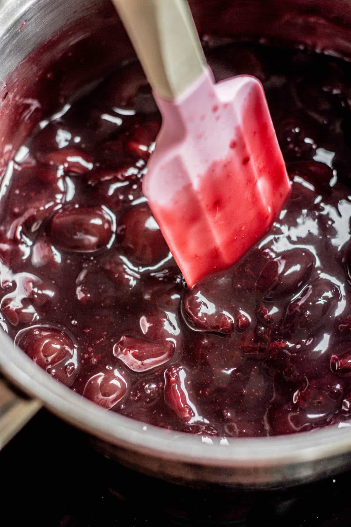 cherry filling being made in a pan.