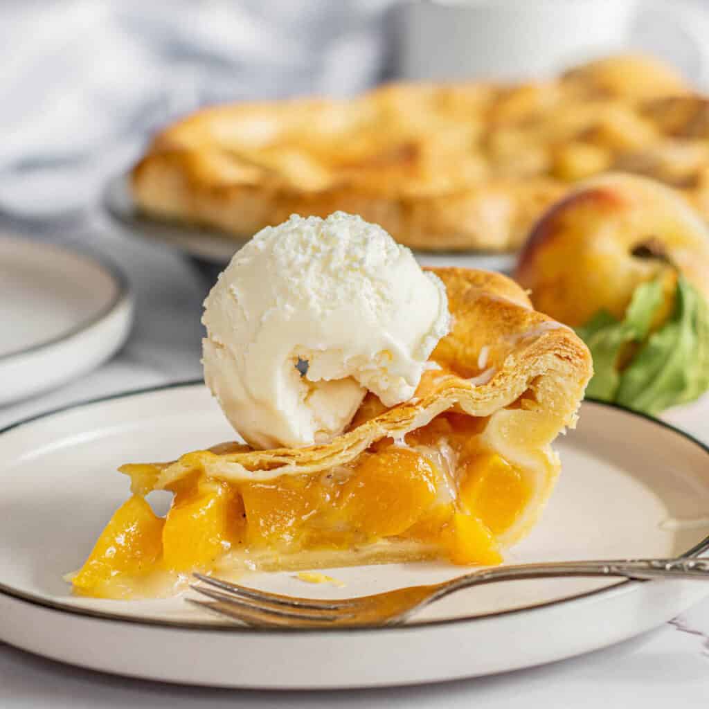 Side view of peach pie.