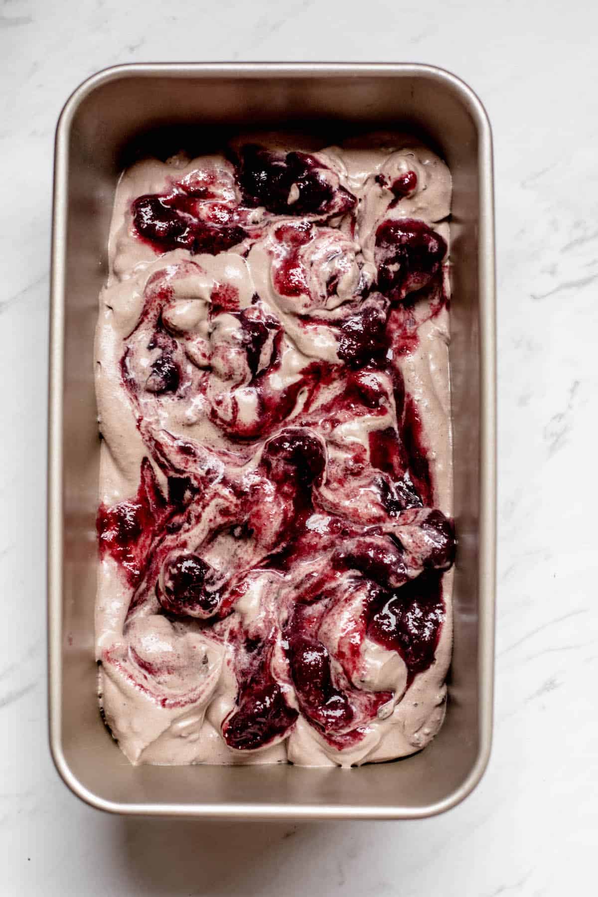cherry swirled into ice cream.