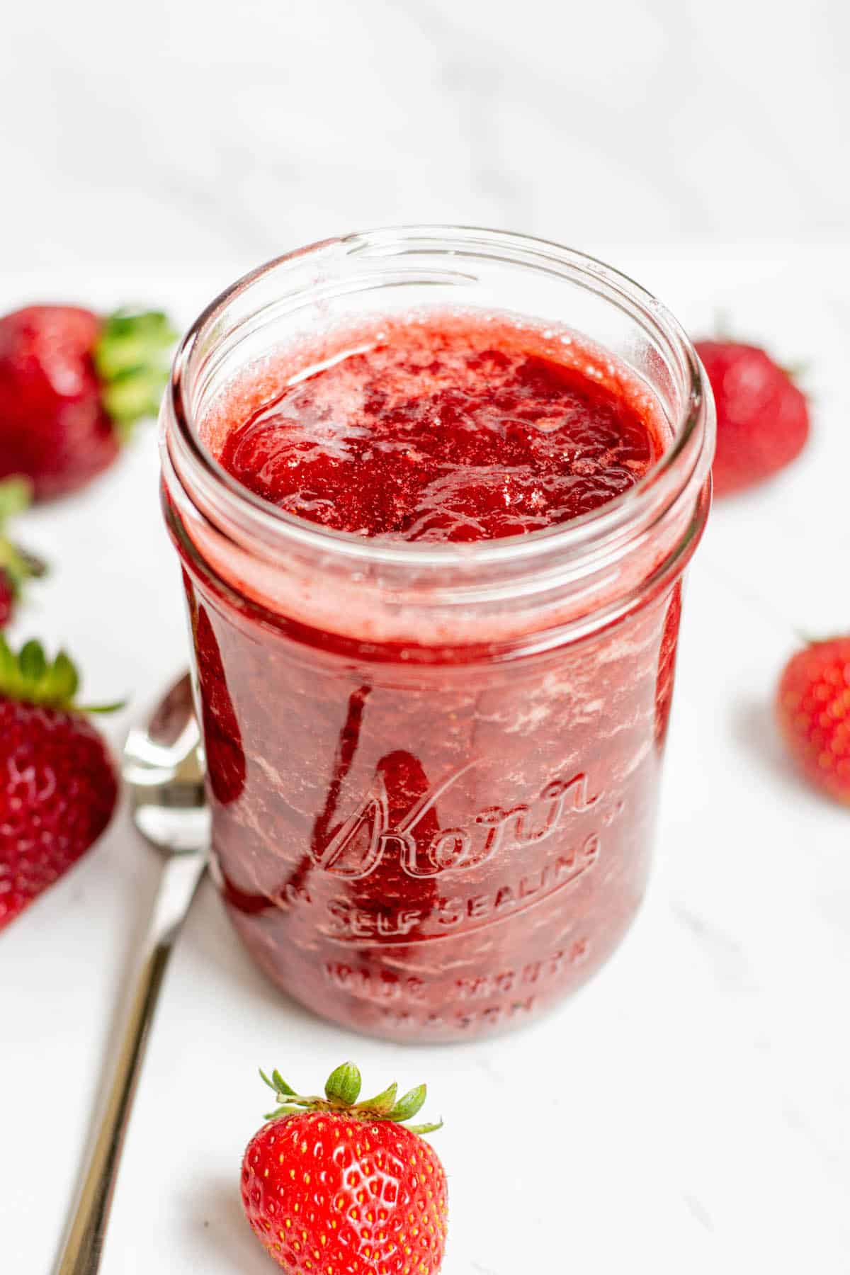 a jar of fresh strawberry compote.