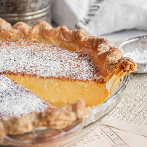 chess pie with piece cut out.