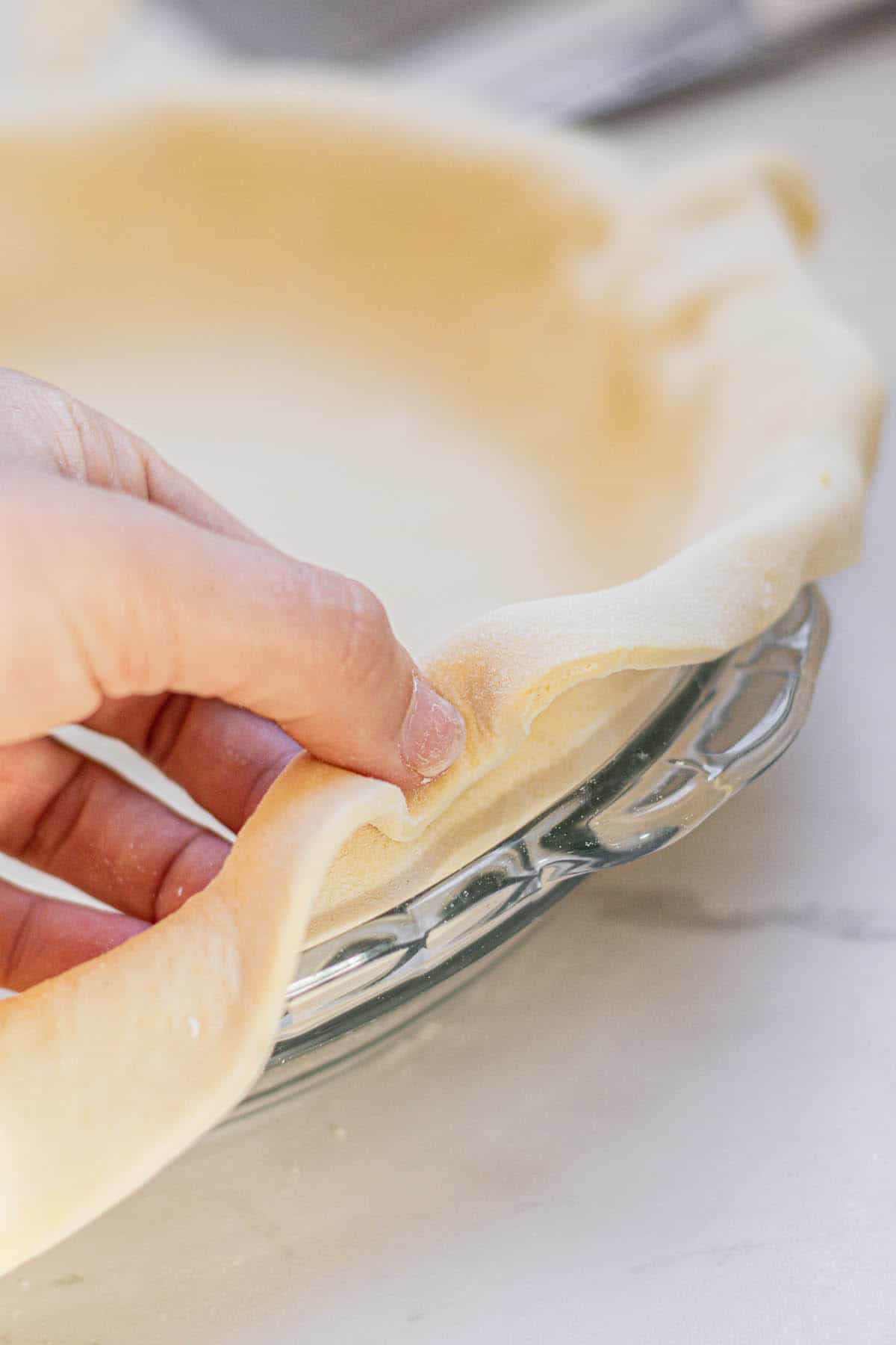 hand folding pie crust.