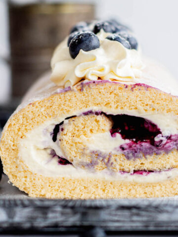 Blueberry swiss roll close up.