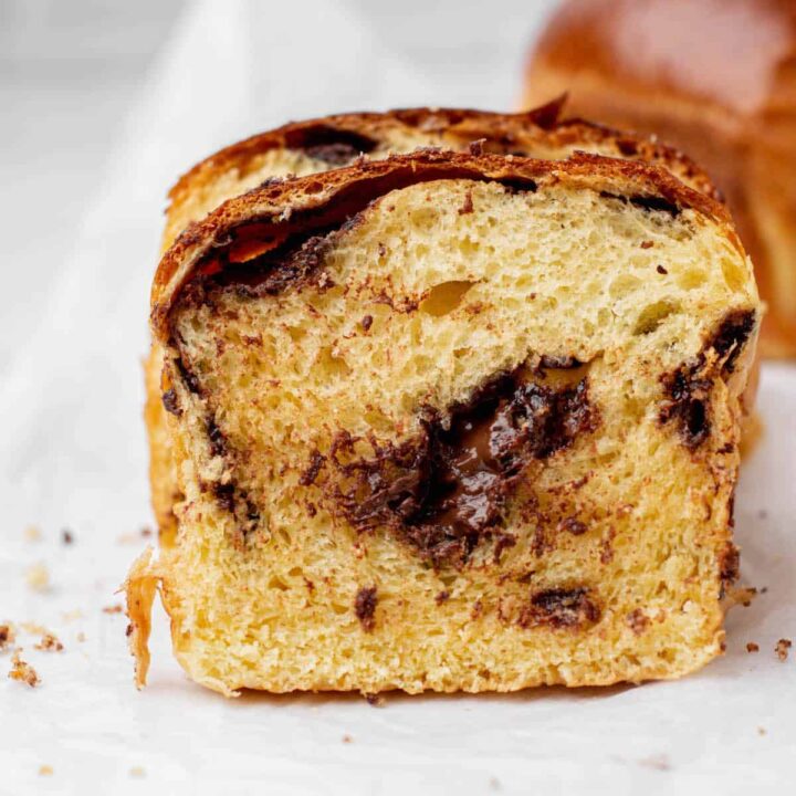 side view of brioche with melted chocolate.