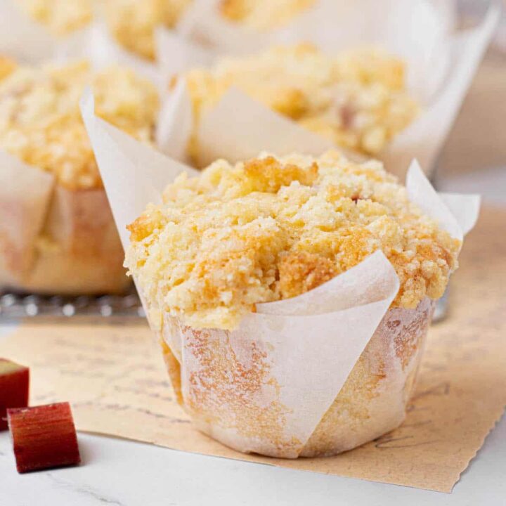 baked muffins with 2 pieces of rhubarb.
