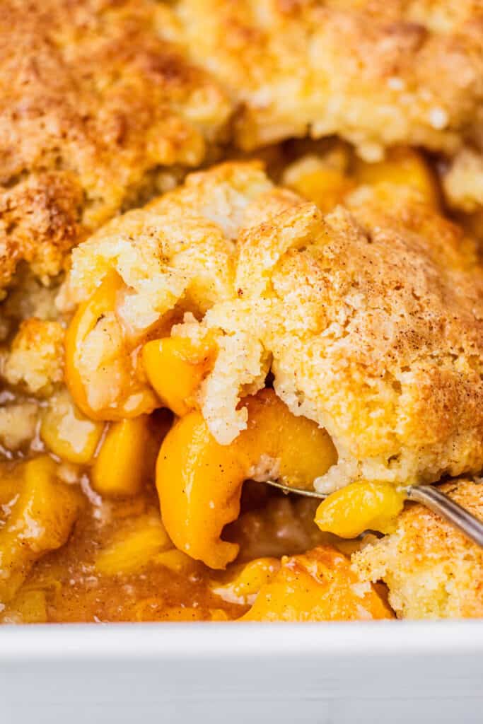 Peach Cobbler with Canned Peaches Baking with Butter