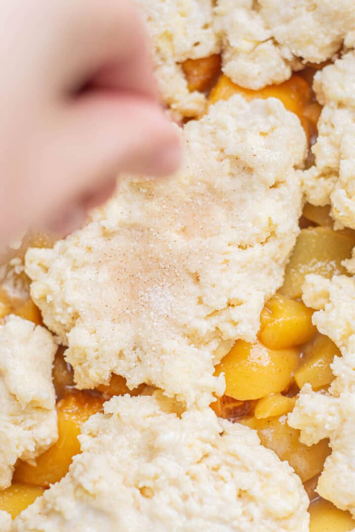 Peach Cobbler with Canned Peaches Baking with Butter