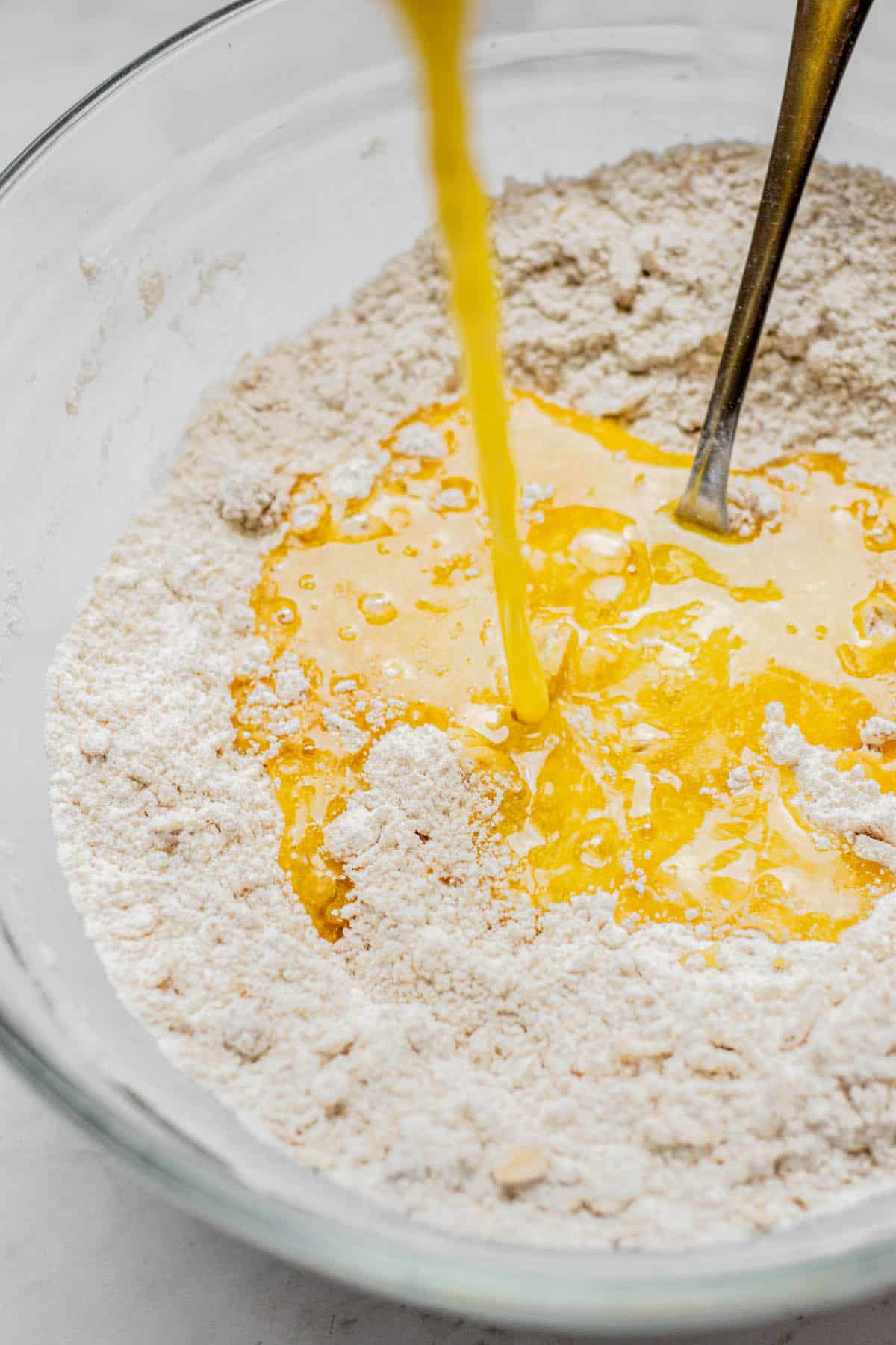 butter poured into flour mixture