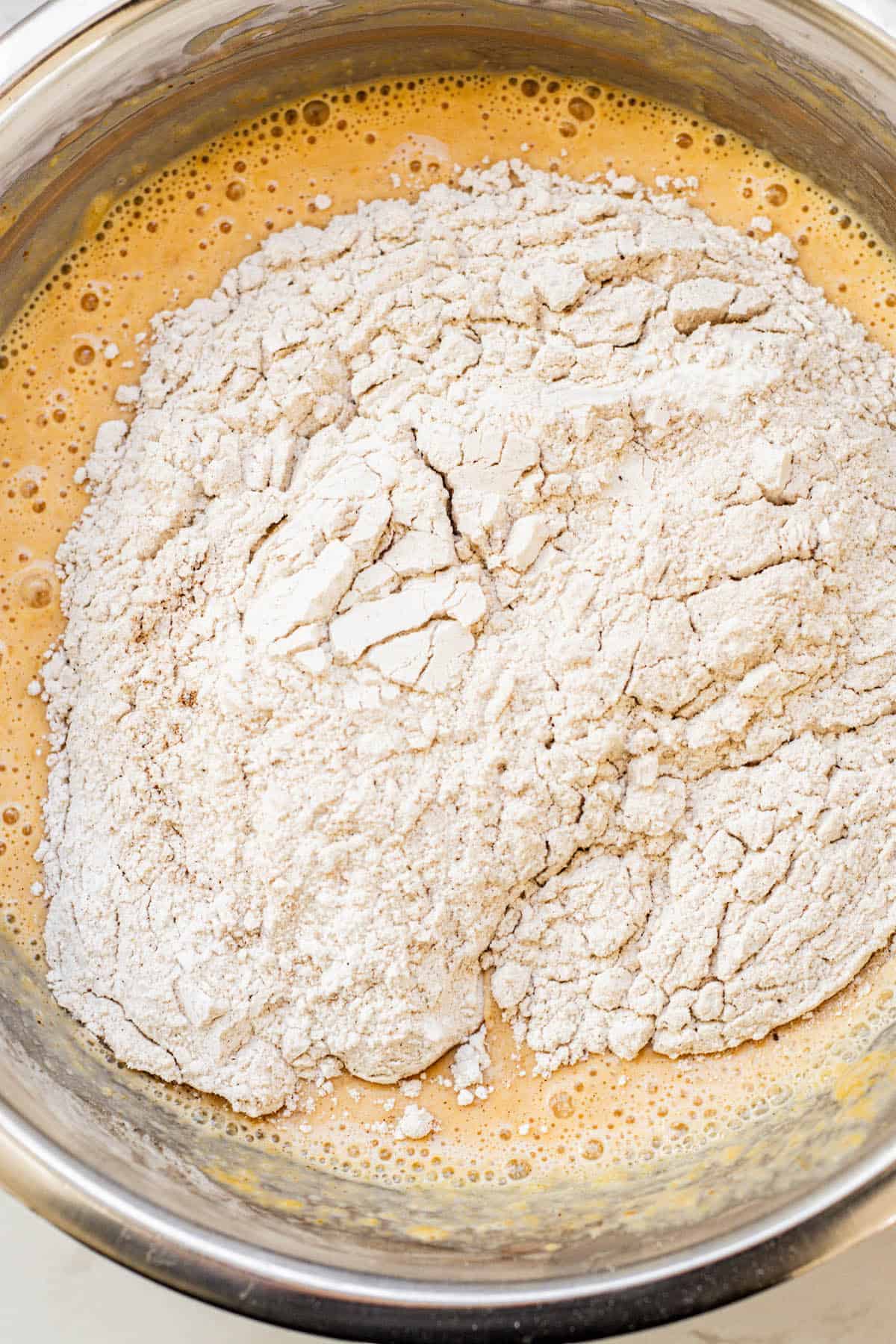 dry ingredients added to pumpkin pancake batter.