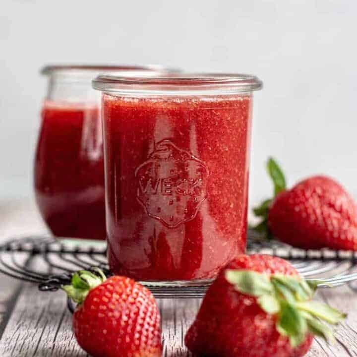 a jar of strawberry coulis.