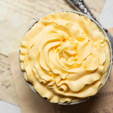 piped Crème mousseline in a little bowl.