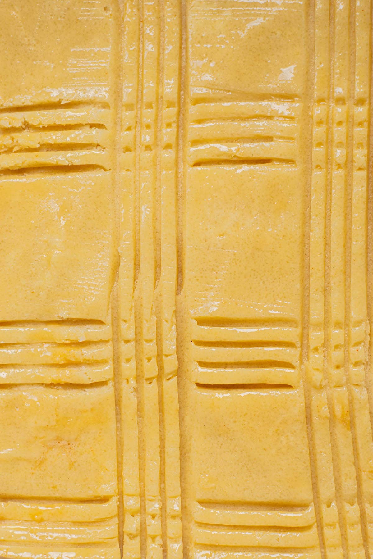 tines of fork stripes in buttery dough.