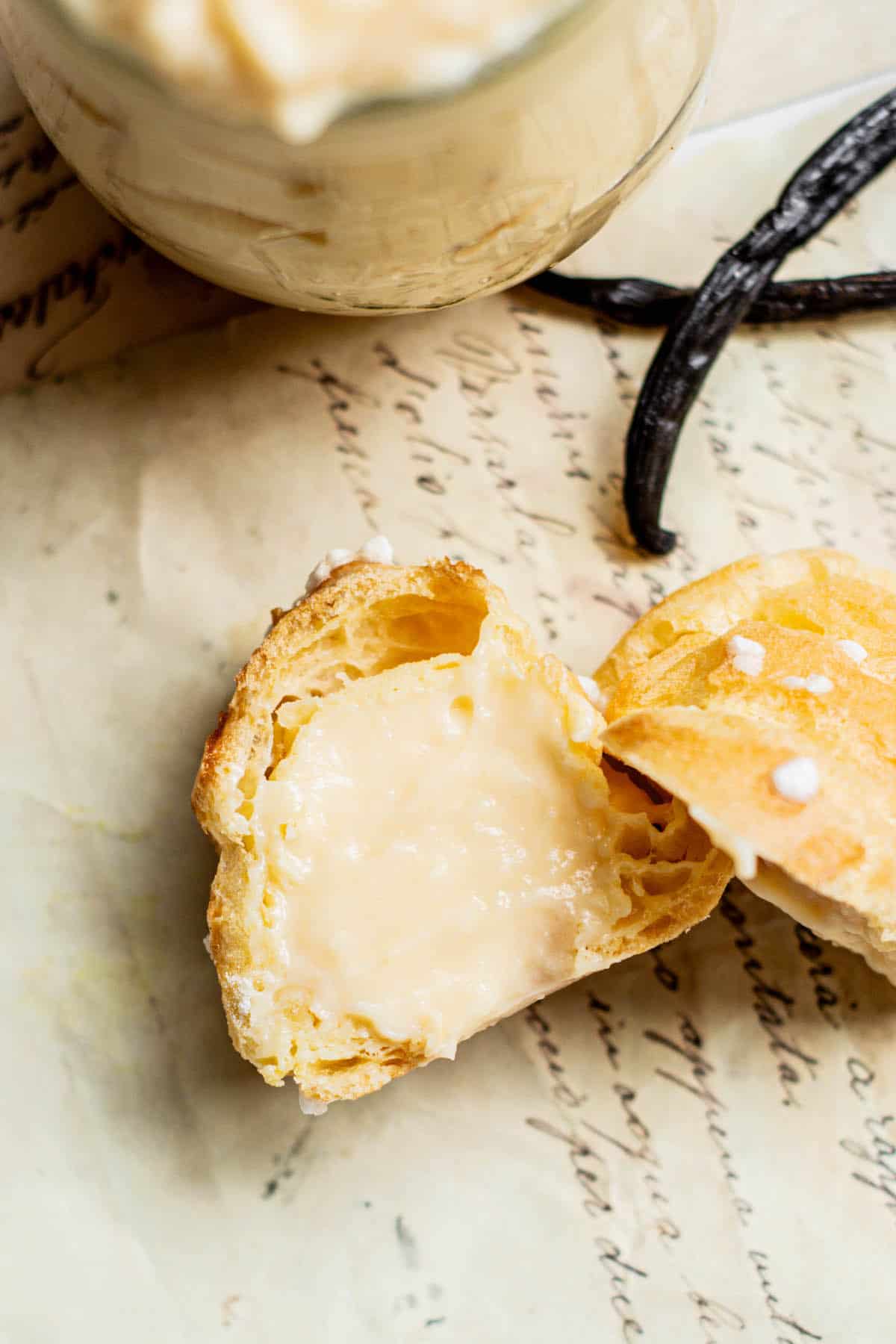 halved chouquette pastry filled with vanilla pastry cream.