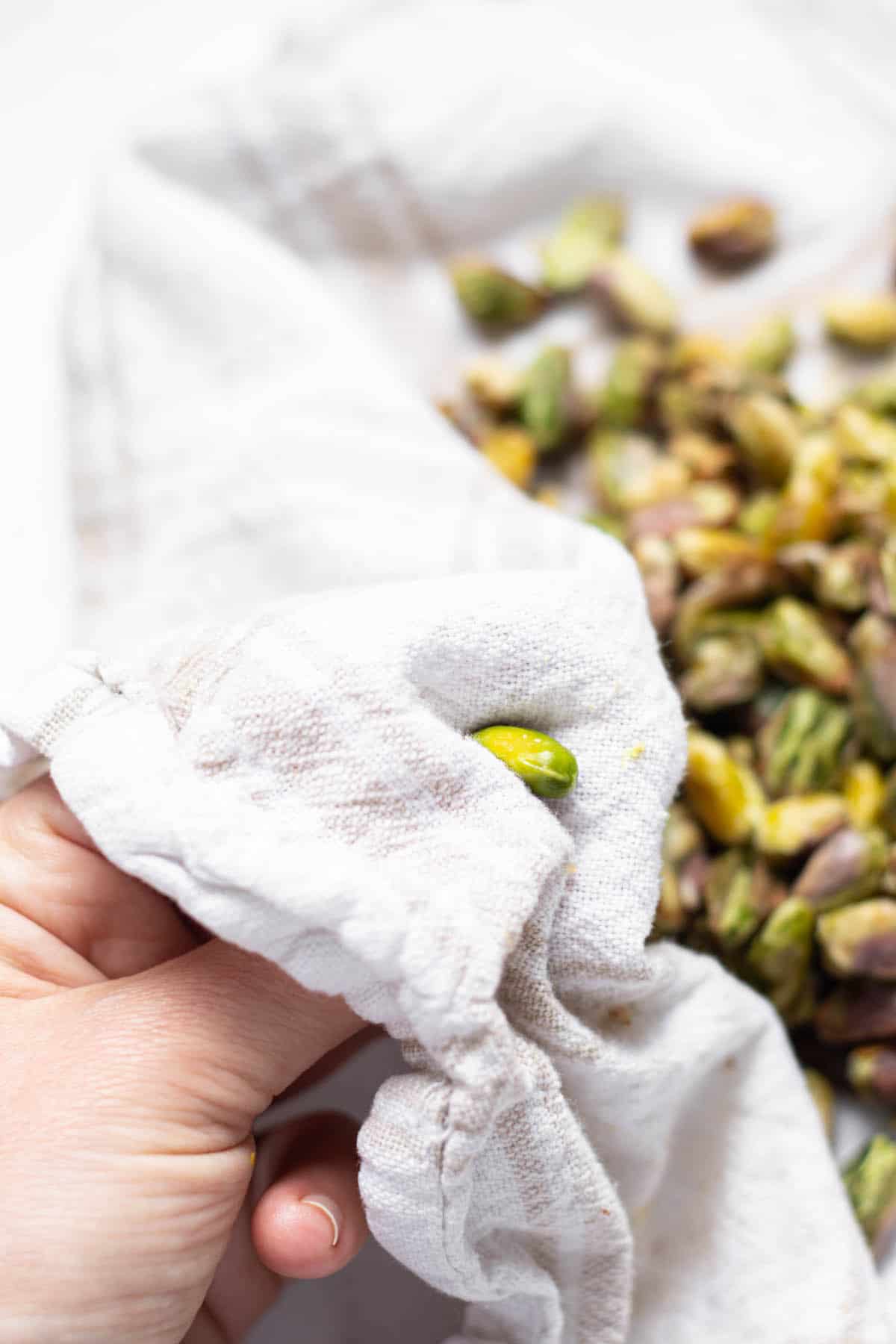 pistachio rubbed in kitchen towel.