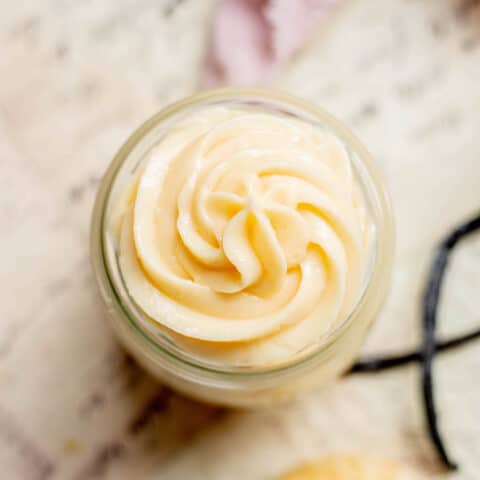 bird's eye view of little jar of swirled crème pâtissière.