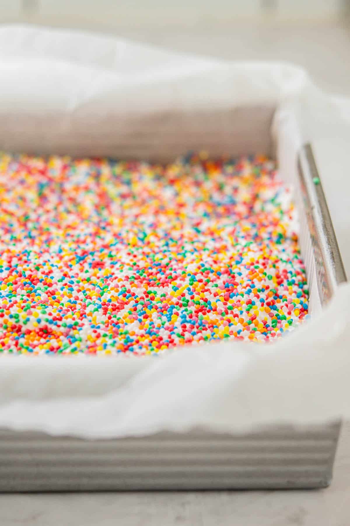 side view of sprinkle topped cake pan.