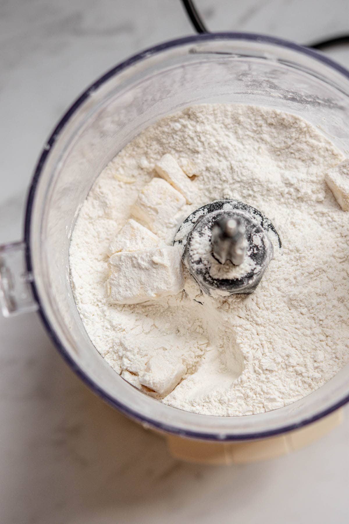 flour and butter pieces in a blender.