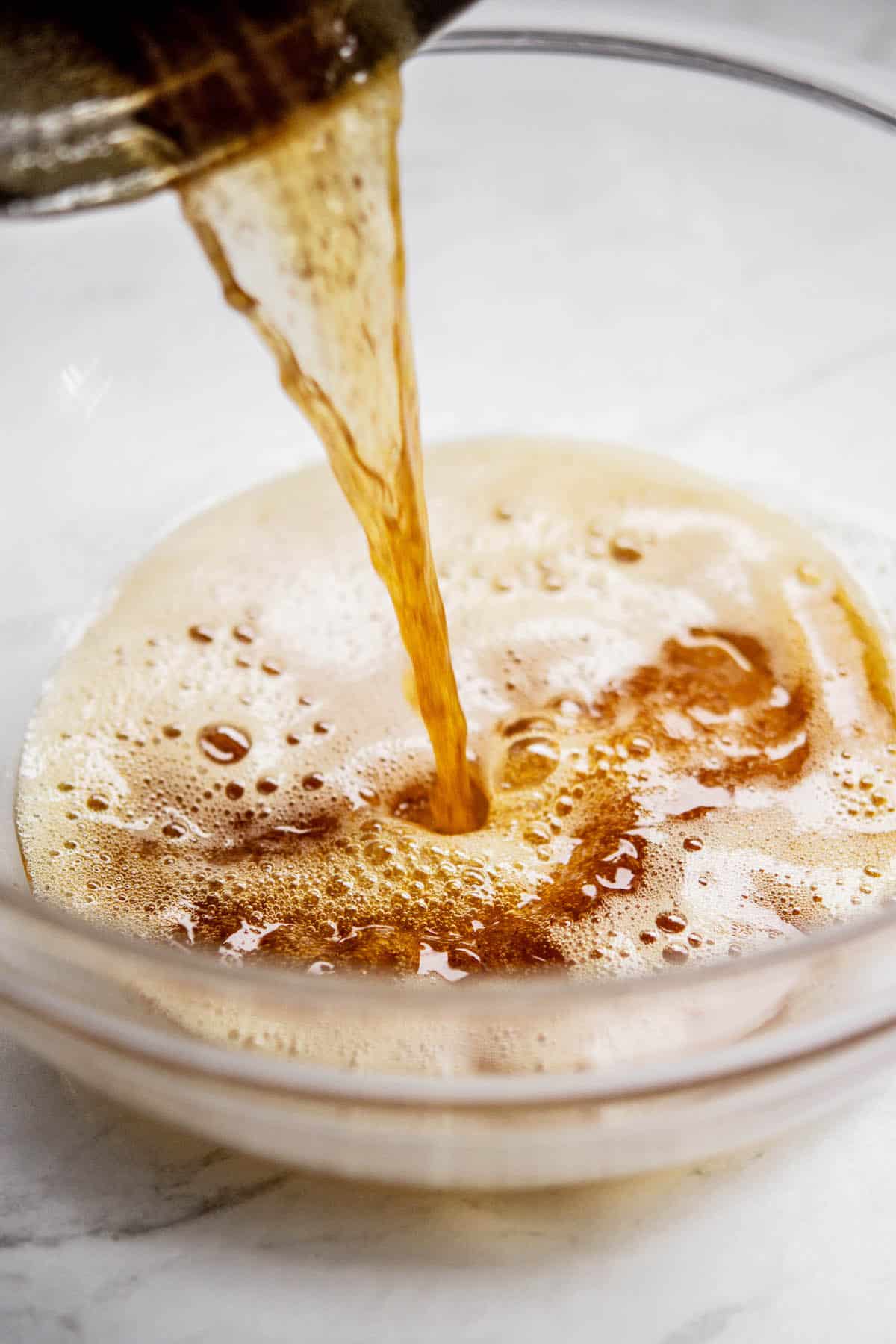 brown butter poured into bowl.